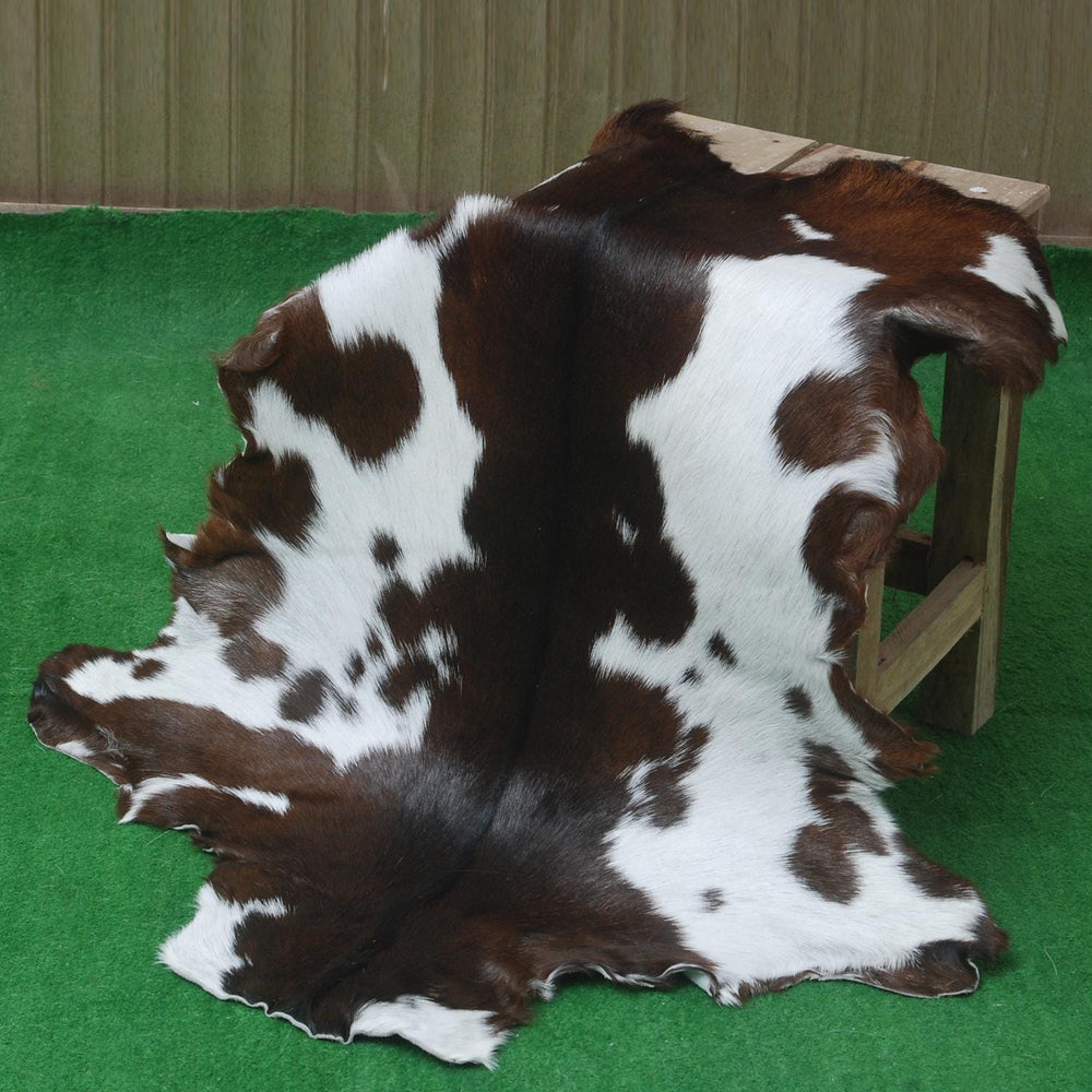 Luxury Dark Brown & White Goat Skin Rug - Soft, Hypoallergenic & Non-Shedding - Non-Slip Backing, Eco-Friendly - Handmade Natural Beauty for Home - Celestial Leather Limited