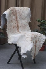 Luxurious Brown and White Genuine Goat Hide Rug - Premium Hair-on Skin Rug for Home Decor - Celestial Leather Limited