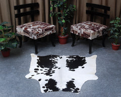 Luxury Handcrafted Cowhide Rug in Bold Black and White - Stunning Home Décor Accent with Hypoallergenic Properties