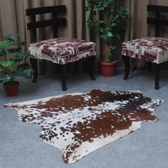 Luxurious Handcrafted Dark Brown & White Cowhide Rug - Hypoallergenic - Durable with Unique Markings, Medium Size for Chic Home Decor