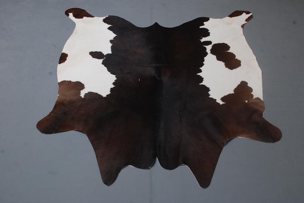 Stunning Large Dark Brown & White Cowhide Rug | Hypoallergenic - Non-Slip | Handselected Premium Hide | Luxurious - Durable Décor Rug - Celestial Leather Limited