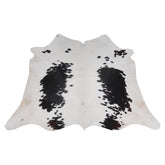 Luxurious Black and White Cowhide Rug - Handcrafted, Hypoallergenic, Non-Slip Backing, Unique Natural Beauty and Durability - Celestial Leather Limited