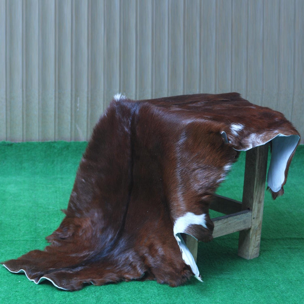 Luxurious Brown and White Goat Hide Rug - Premium Handcrafted Hair-On Goatskin Rug for Elegant Home Decor - Celestial Leather Limited