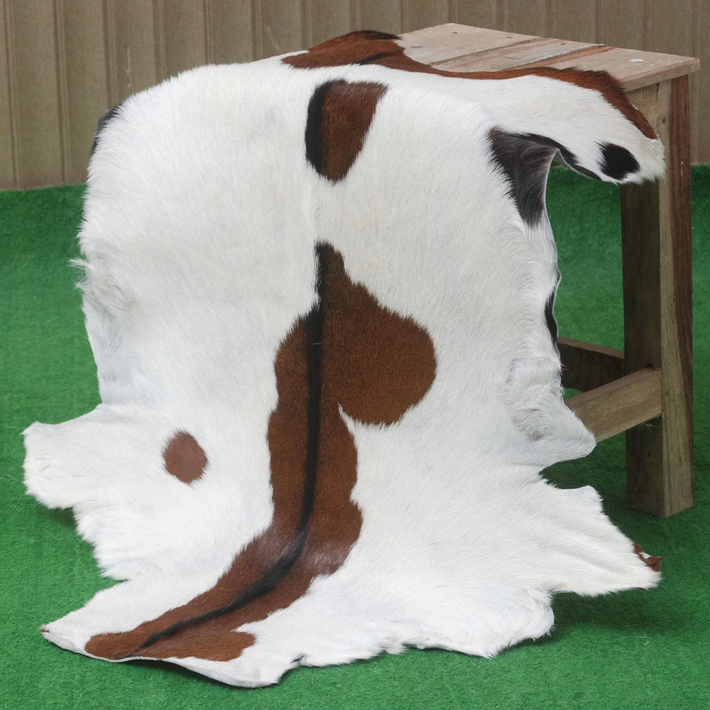 Luxury Handmade Dark Brown White Goat Skin Rug with Non-Slip Suede Backing - Eco-Friendly Natural Beauty for High-Traffic Areas - Celestial Leather Limited