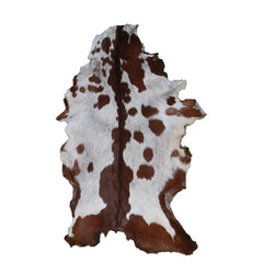 Luxurious Brown and White Goat Skin Rug - Premium Hair-On, Natural, and Sustainable - Elegant Home Decor Addition - Celestial Leather Limited