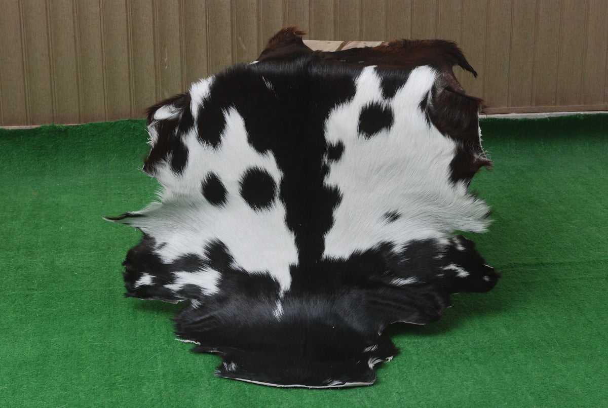 Natural Black and White Goat Hide Rug - Luxurious and Stylish Floor Accent