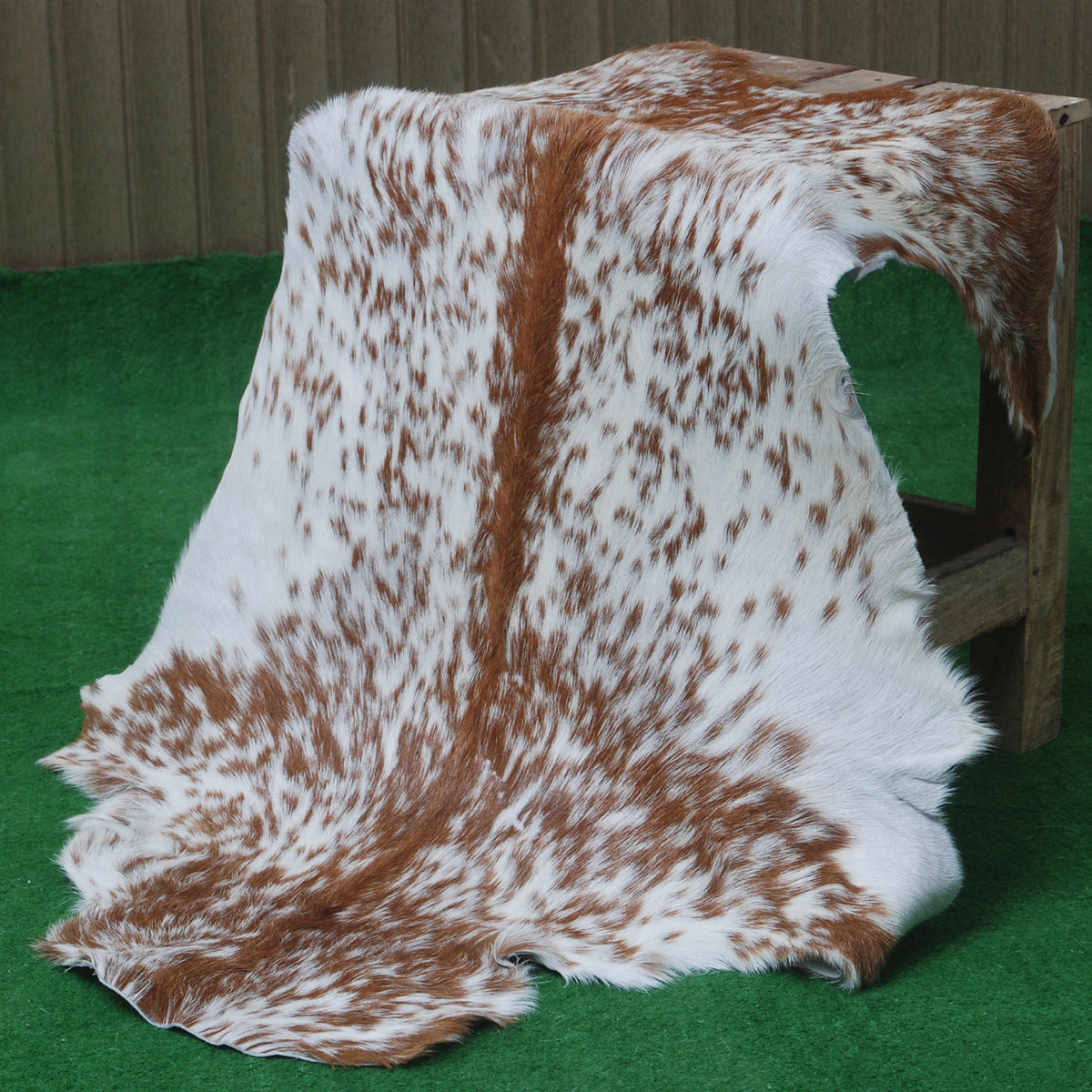 Luxurious Brown and White Goat Hide Rug - Natural Hair-On Leather for Home Styling