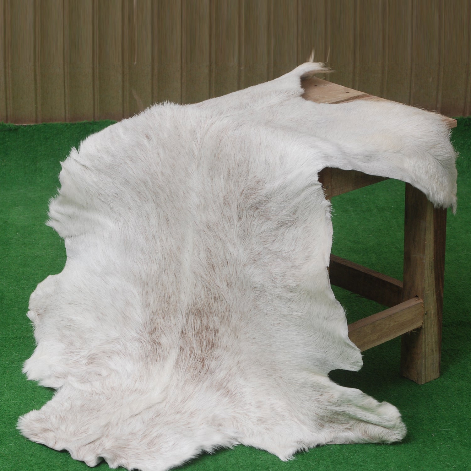 Luxurious Grey and White Natural Goat Skin Rug for Tranquil Wall Decor - Celestial Leather Limited