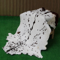 Rustic Black and White Goat Hide Rug - Perfect for Floor or Wall Décor