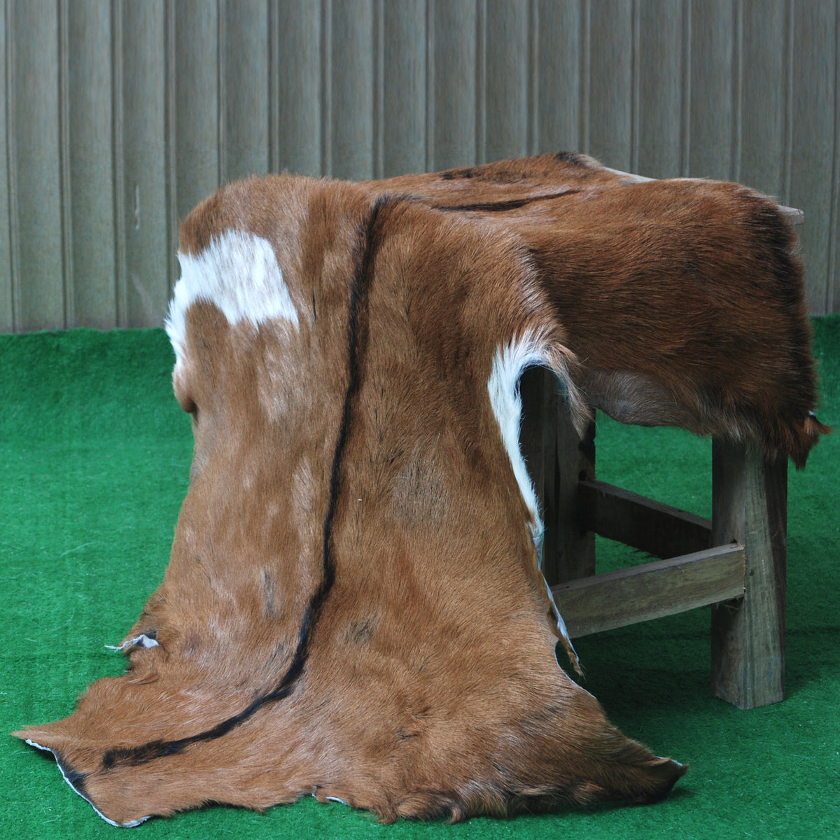 Natural Hair-On Dark Brown Goat Skin Rug - Elegant and Durable for Any Room