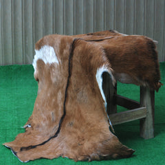 Natural Hair-On Dark Brown Goat Skin Rug - Elegant and Durable for Any Room