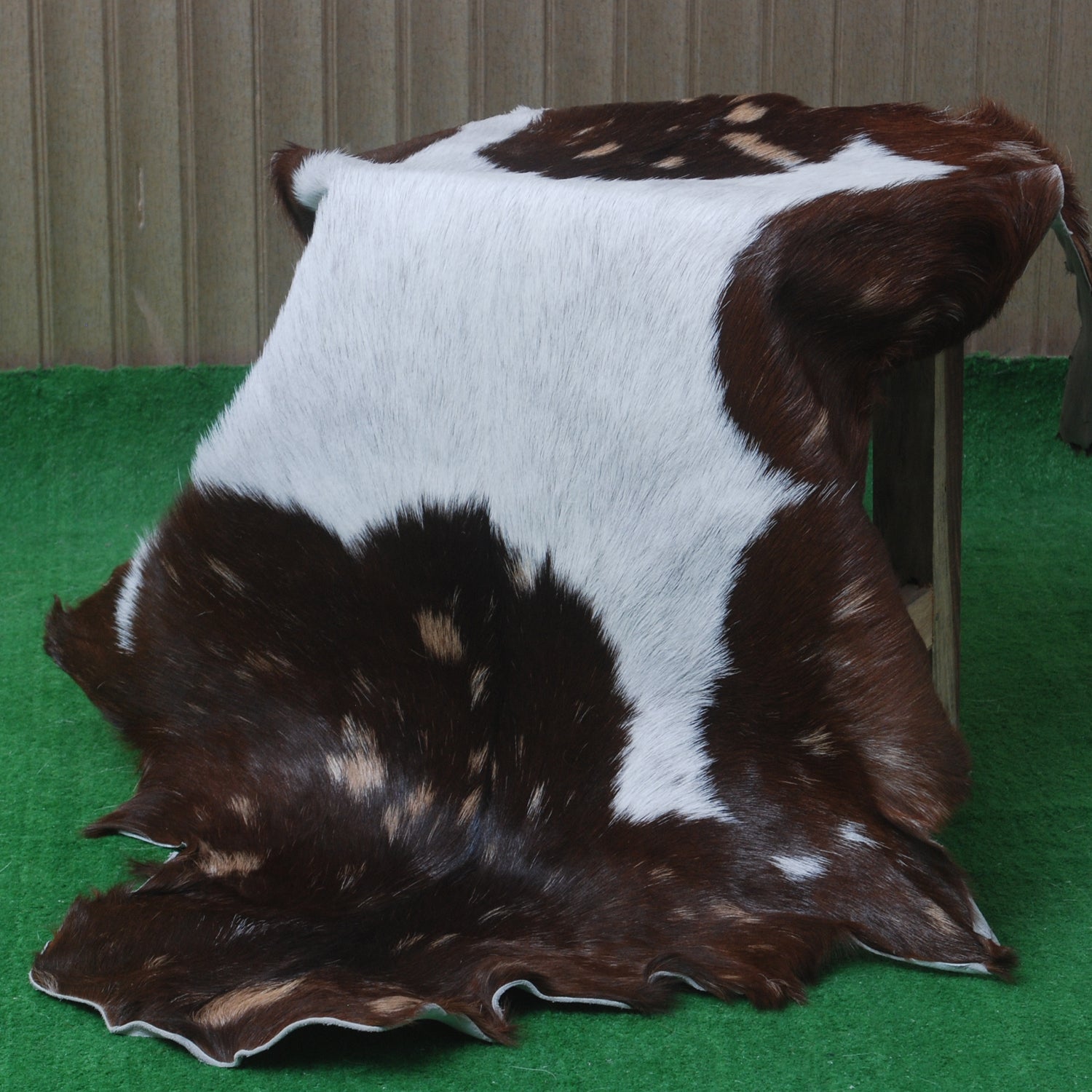 Decorative Brown and White Goat Hide Rug - Perfect for Floor or Wall Accents