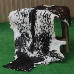 Decorative Black and White Goat Skin Rug - Genuine Leather for Sophisticated Spaces