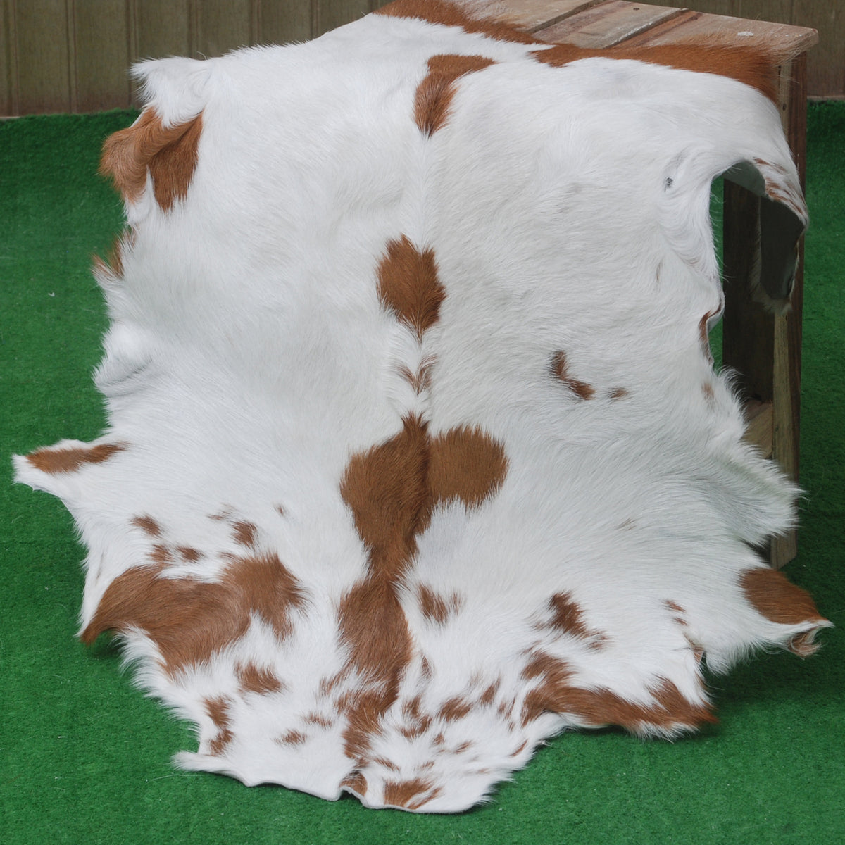 Decorative Brown and White Goat Hide Rug - Perfect for Floor or Wall Accents