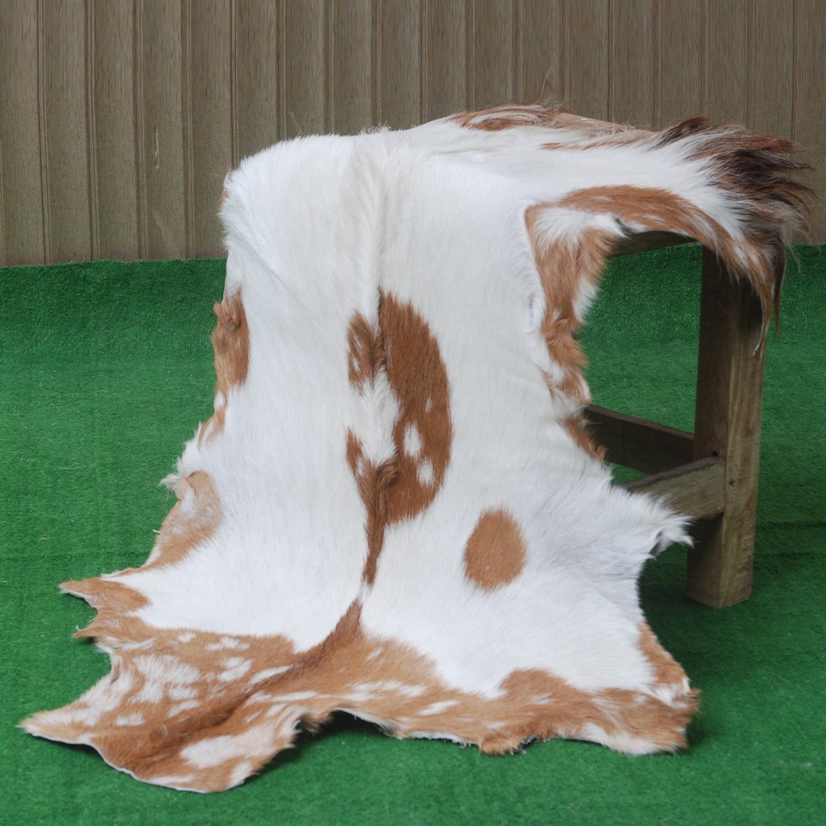 Rustic Brown and White Goat Skin Rug - Unique Pattern for Modern and Classic Décor