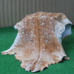 Natural Brown and White Goat Hide Rug - Luxurious Accent for Modern Homes