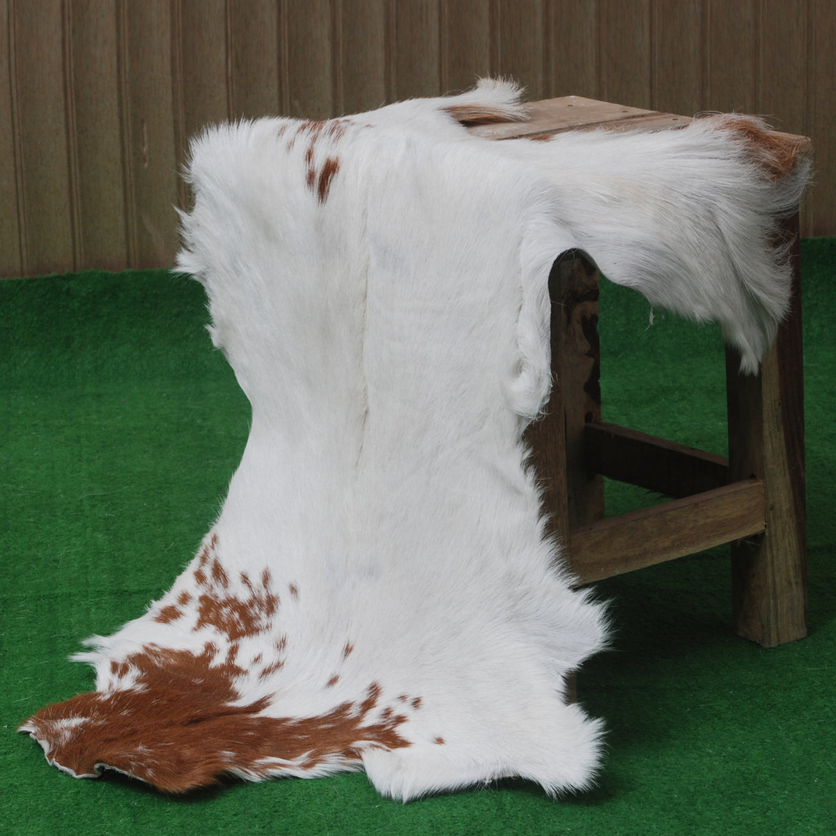 Handcrafted Brown and White Goat Skin Rug - Soft, Durable, and Elegant Décor