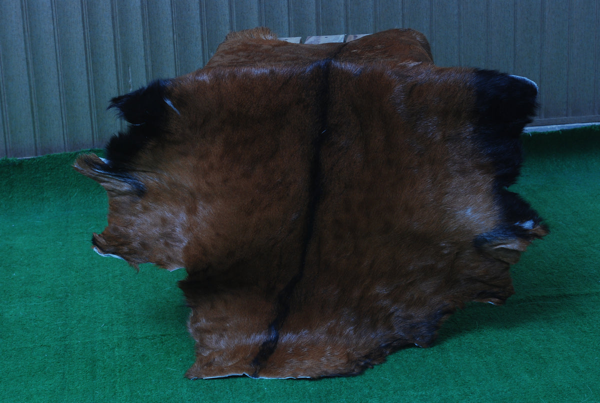 Natural Dark Brown Goat Hide Rug - Perfect for Modern and Rustic Spaces