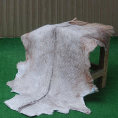 Luxurious Brown and White Goat Hide Rug - Natural Hair-On Leather for Home Styling