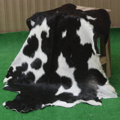 Black and White Handmade Goat Skin Rug – Natural Luxury for Your Home