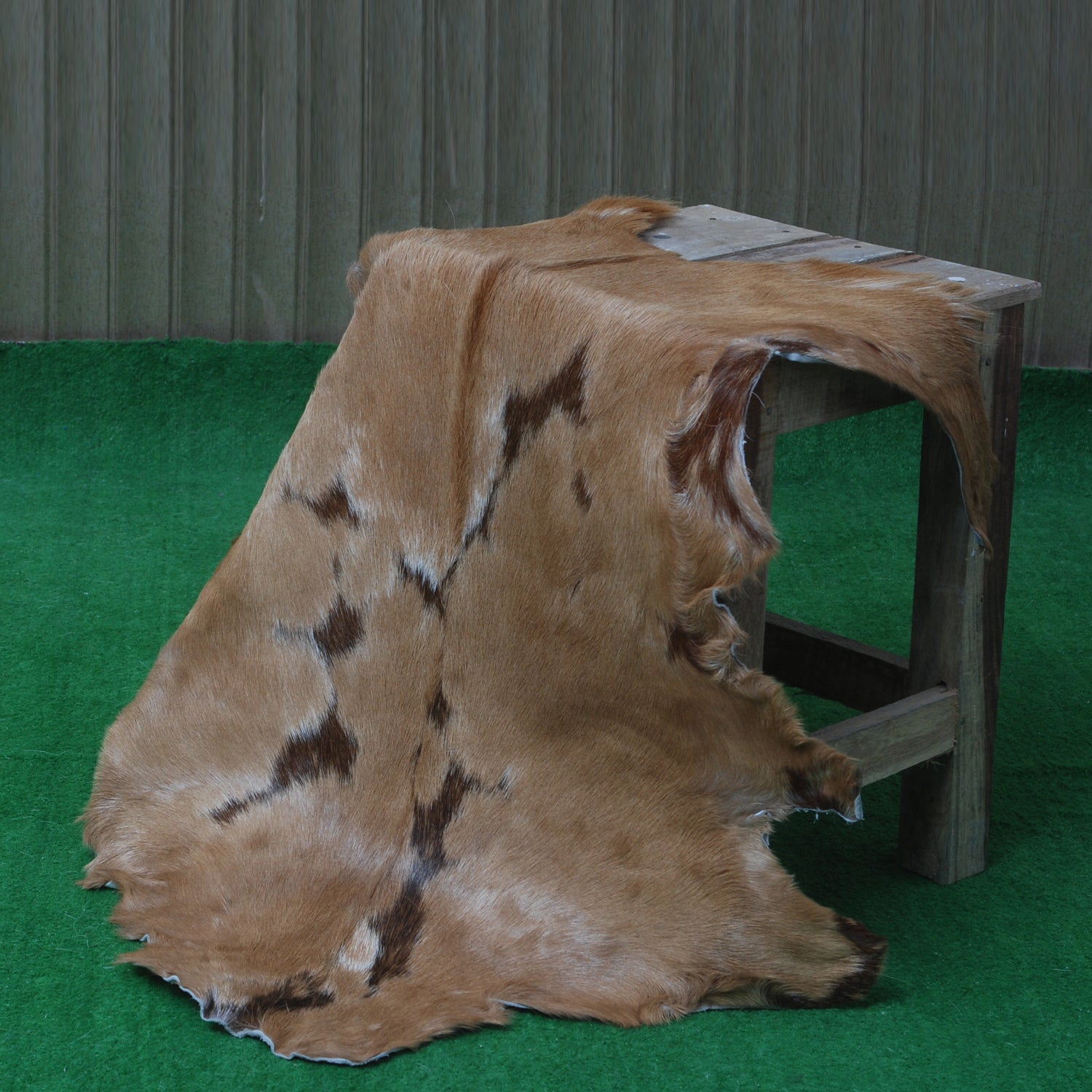Luxurious Brown and White Goat Hide Rug - Natural Hair-On Leather for Home Styling