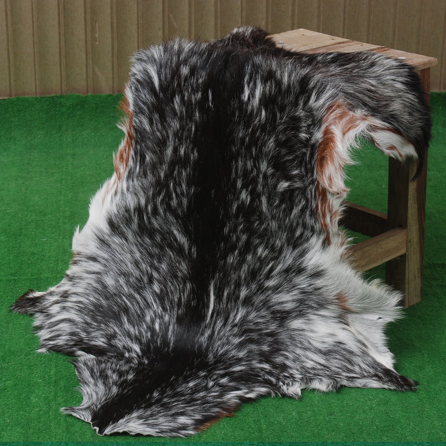 Rustic Black and White Goat Hide Rug - Perfect for Floor or Wall Décor