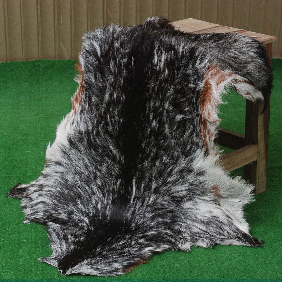 Rustic Black and White Goat Hide Rug - Perfect for Floor or Wall Décor