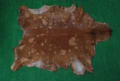 Authentic Hair-On Goat Skin Rug - Brown and White Pattern for Stylish Interiors