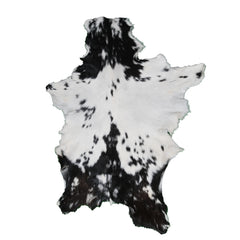 Stylish Black and White Goat Hide Rug - Unique Natural Pattern for Modern Homes
