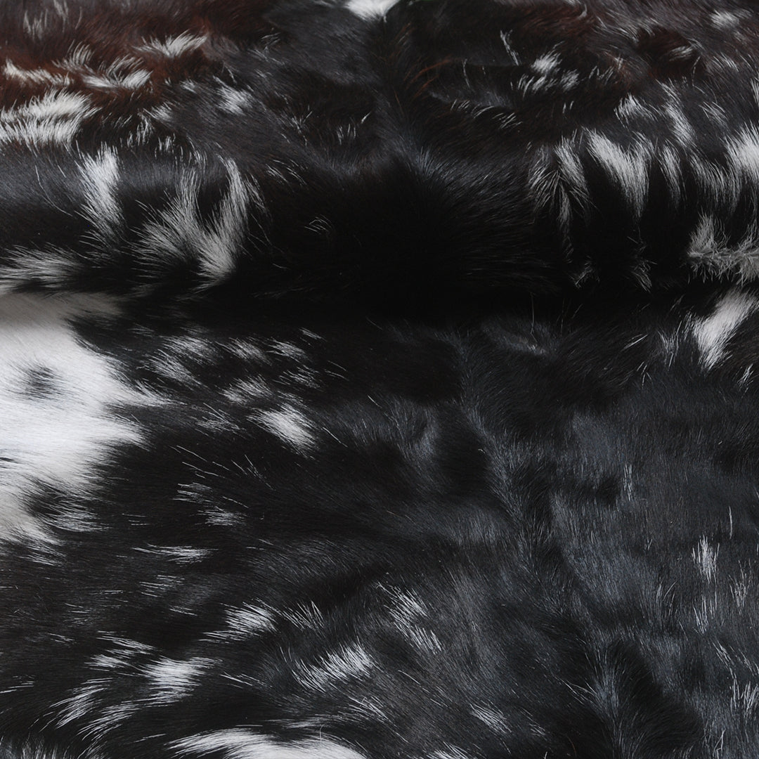 Modern Sophistication: Genuine Black and White Goat Skin Throw Rug for Home Decor - Non-Slippery Back, Hypoallergenic, and Unique Natural