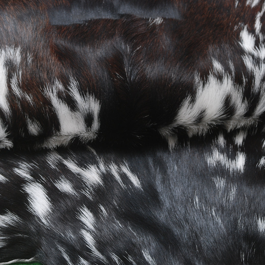 Natural Black and White Goat Hide Rug - Luxurious and Stylish Floor Accent