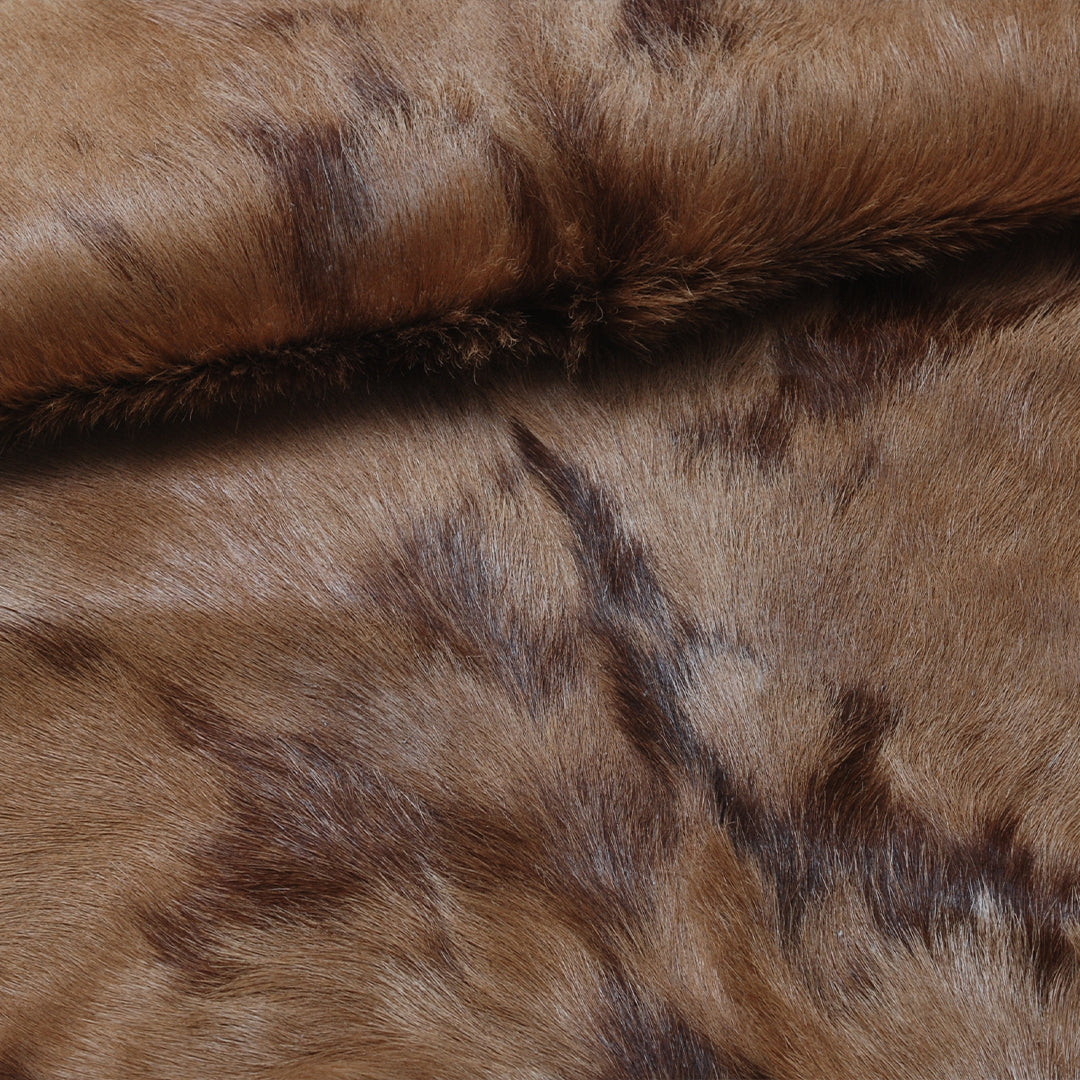 Natural Tri-Color Goat Hide Rug - Luxurious Accent for Rustic and Modern Spaces