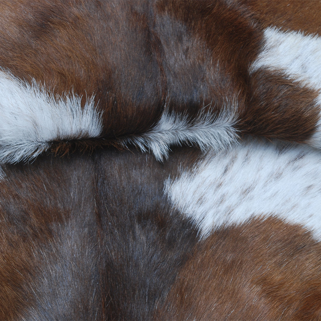 Luxurious Handmade Dark Brown & White Goat Skin Rug - Soft, Durable, Non-Shedding, Eco-Friendly - Unique Statement Piece for Home Décor - Celestial Leather Limited