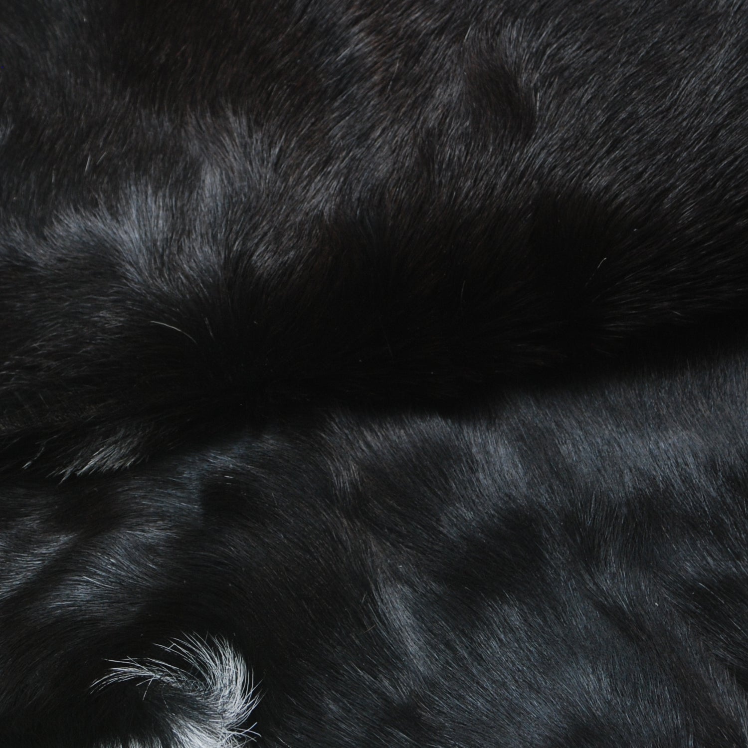 Elegant Black and White Goat Hide Rug - Perfect Accent for Any Room