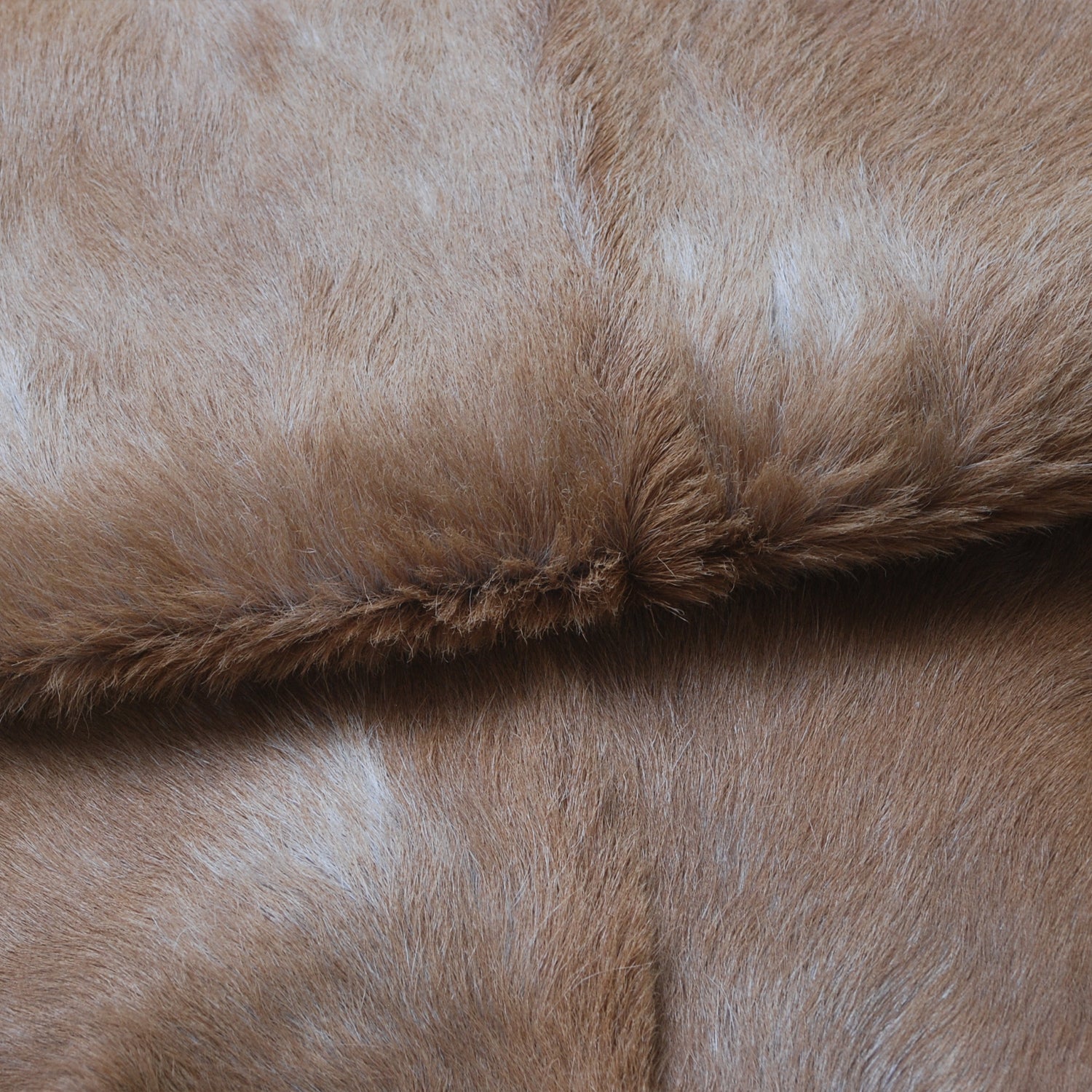 Luxurious Brown and White Goat Hide Rug - Natural Hair-On Leather for Home Styling
