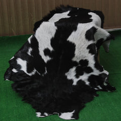 Natural Black and White Goat Hide Rug - Luxurious and Stylish Floor Accent