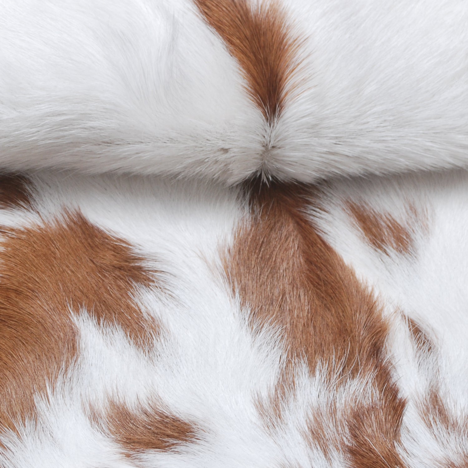 Decorative Brown and White Goat Hide Rug - Perfect for Floor or Wall Accents