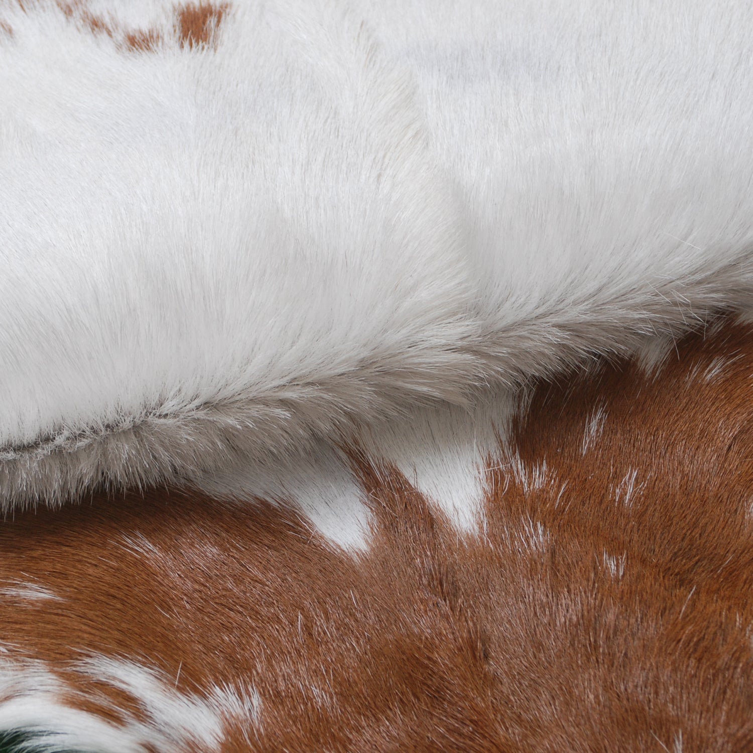 Handcrafted Brown and White Goat Skin Rug - Soft, Durable, and Elegant Décor