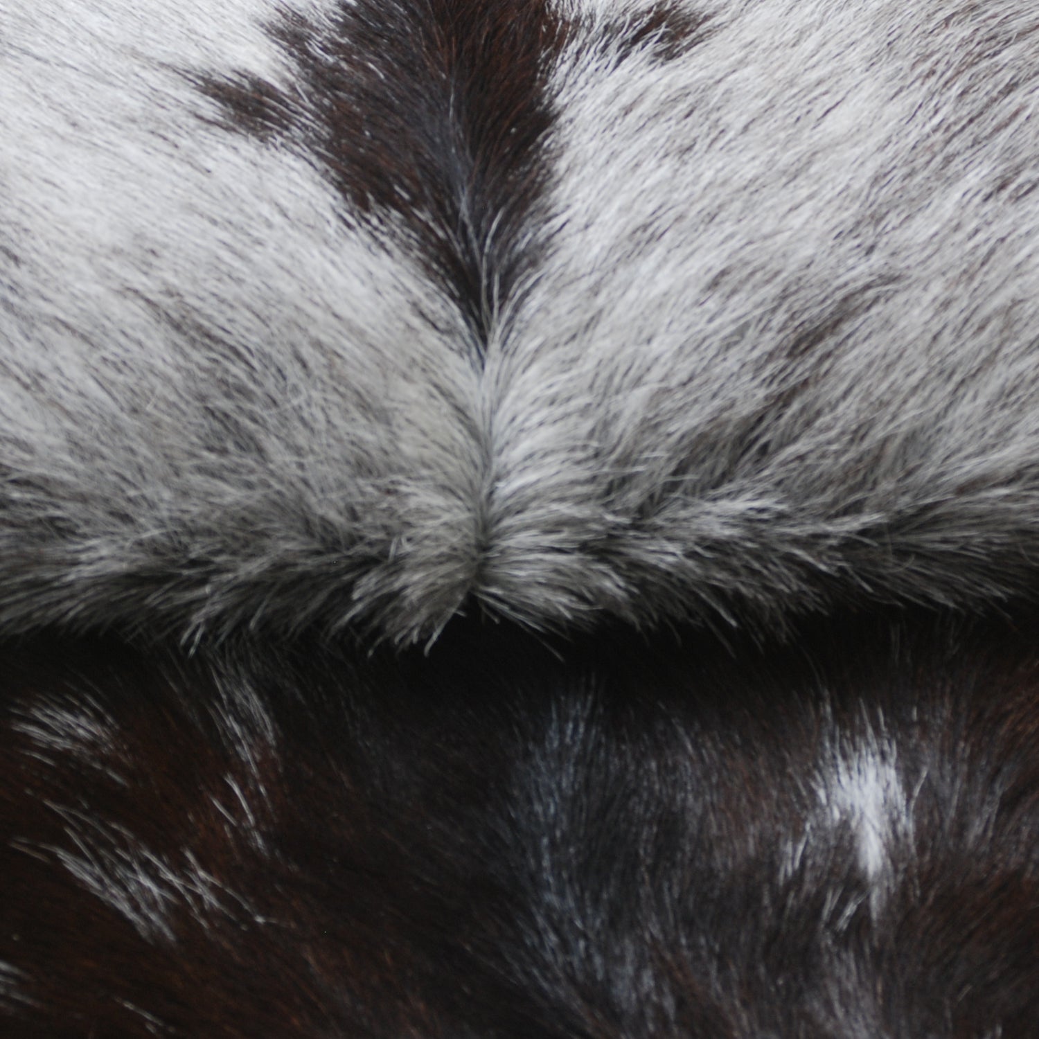 Elegant Black and White Goat Hide Rug - Perfect Accent for Any Room