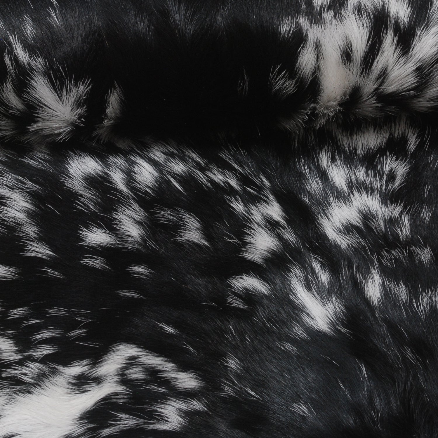 Luxurious Handmade Black & White Goat Skin Rug - Soft, Pet-Friendly, Hypoallergenic, & Eco-Friendly - Unique Statement Piece for Your Home - Celestial Leather Limited