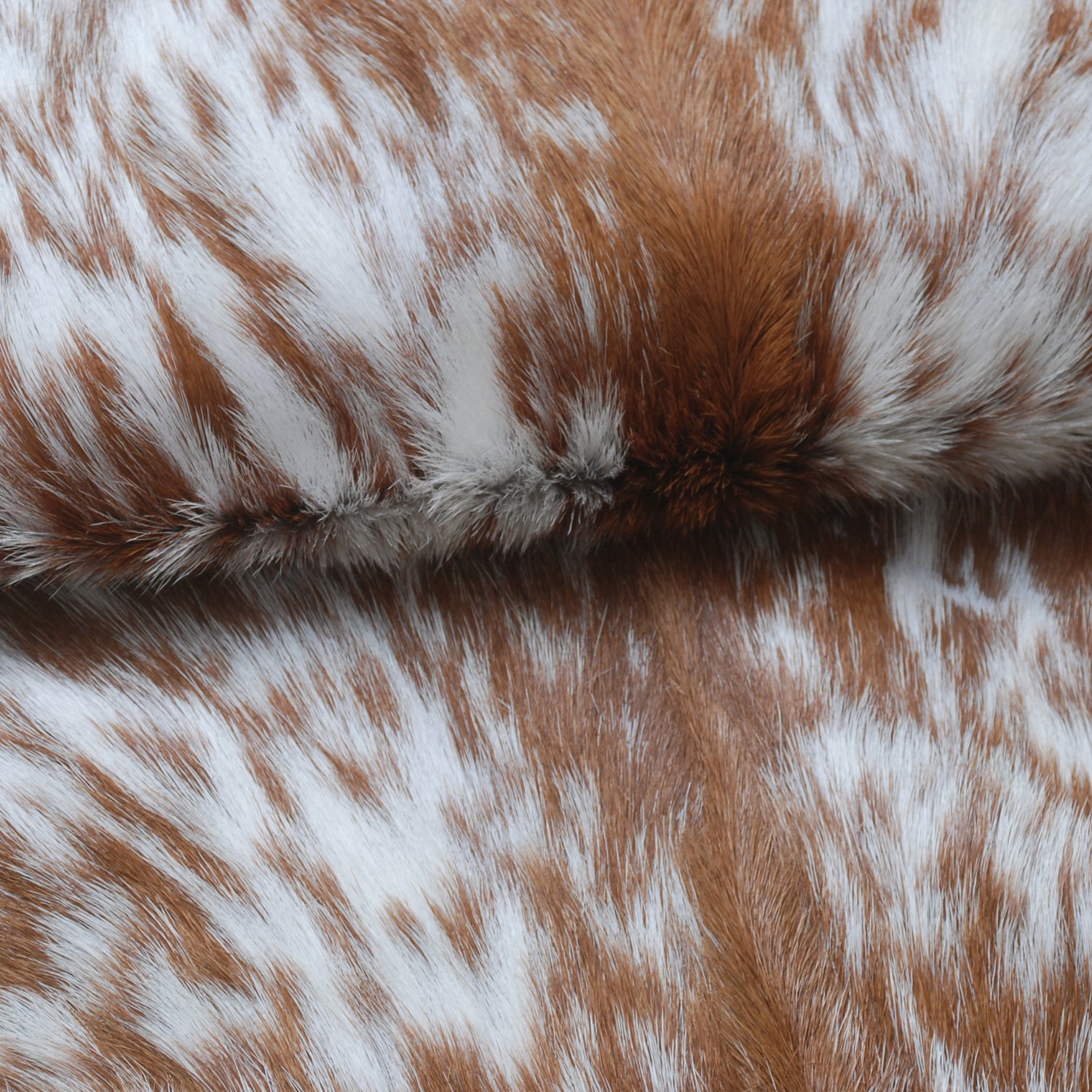 Luxurious Brown and White Goat Hide Rug - Natural Hair-On Leather for Home Styling