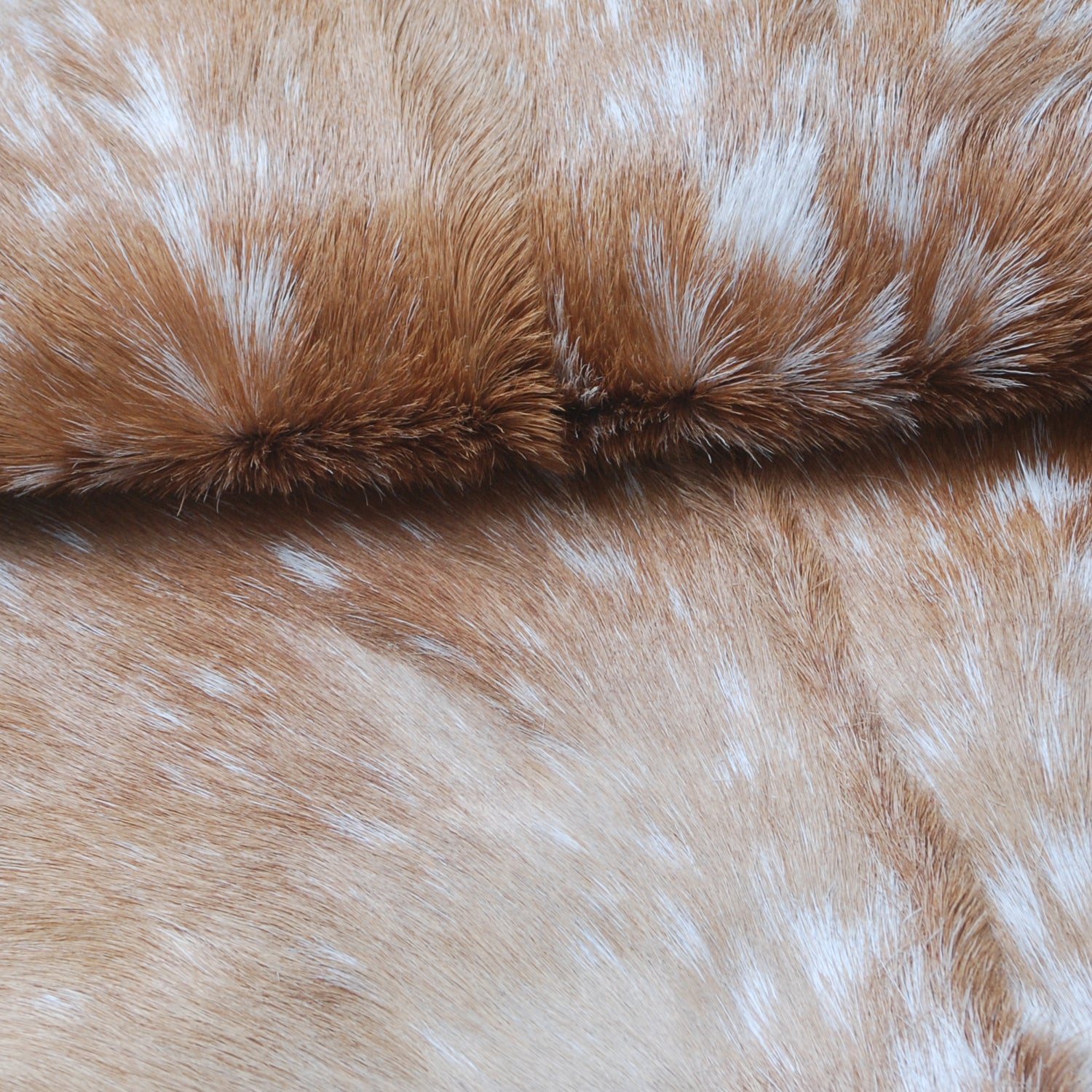 Natural Brown and White Goat Hide Rug - Luxurious Accent for Modern Homes