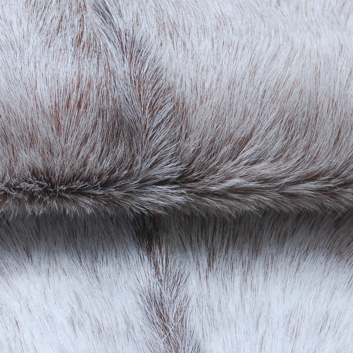 Luxurious Brown and White Goat Hide Rug - Natural Hair-On Leather for Home Styling