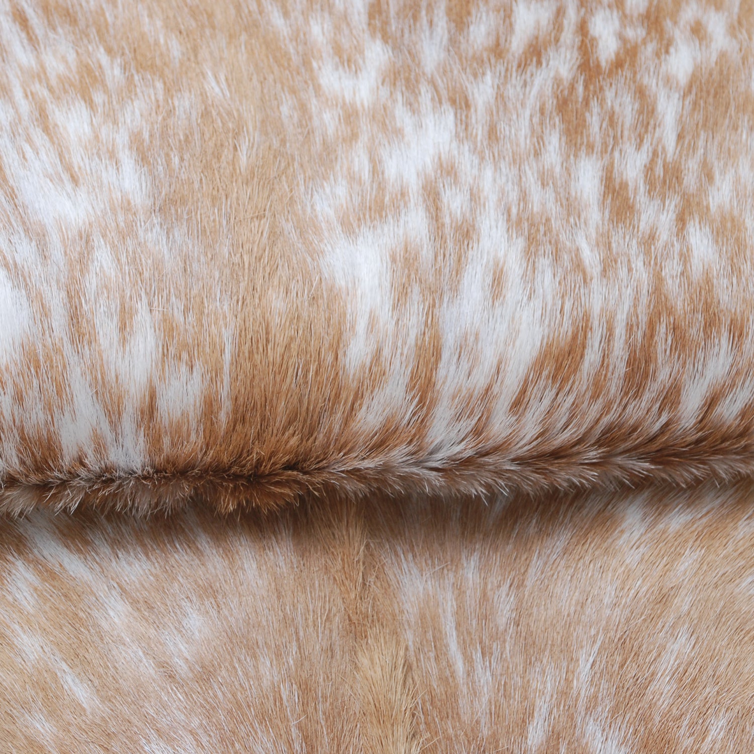 Rustic Brown and White Goat Skin Rug - Unique Pattern for Modern and Classic Décor