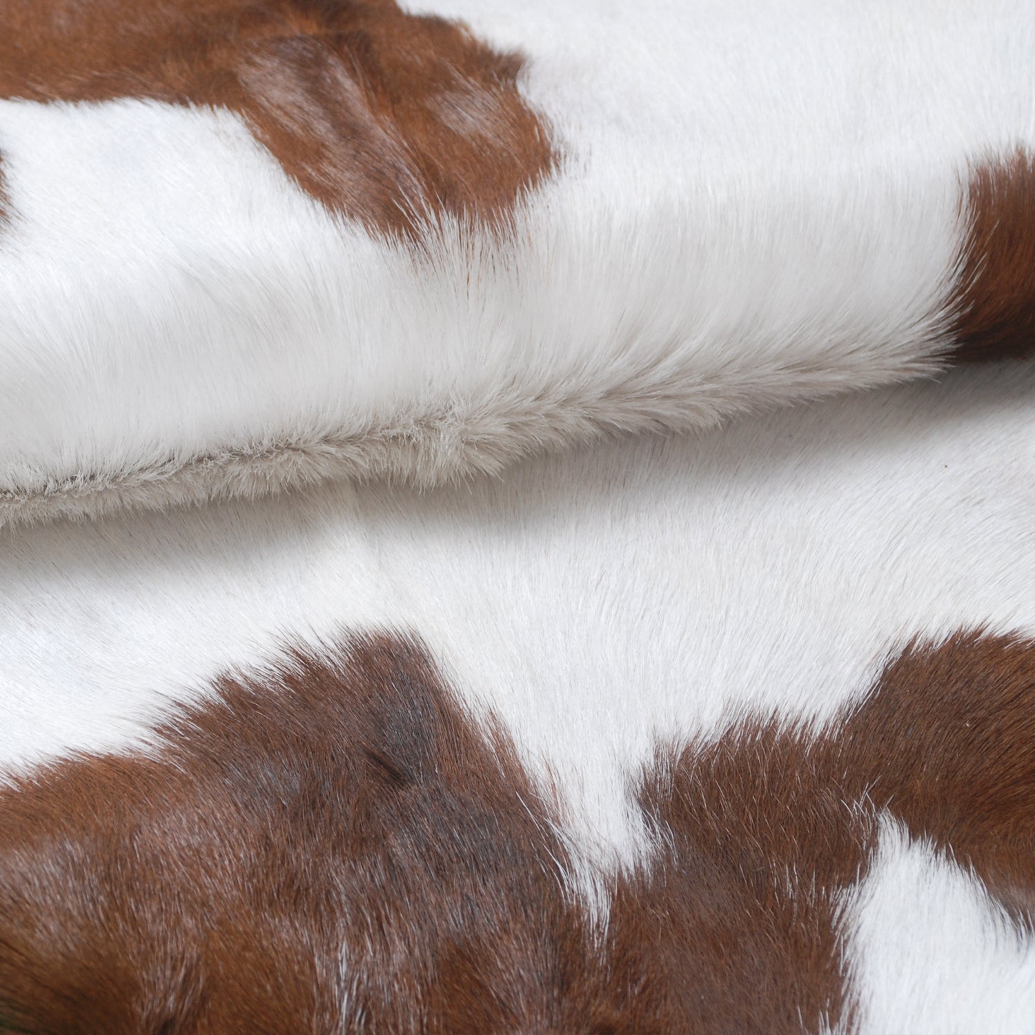 Luxurious Brown & White Goat Skin Rug - Premium Hair On Goatskin