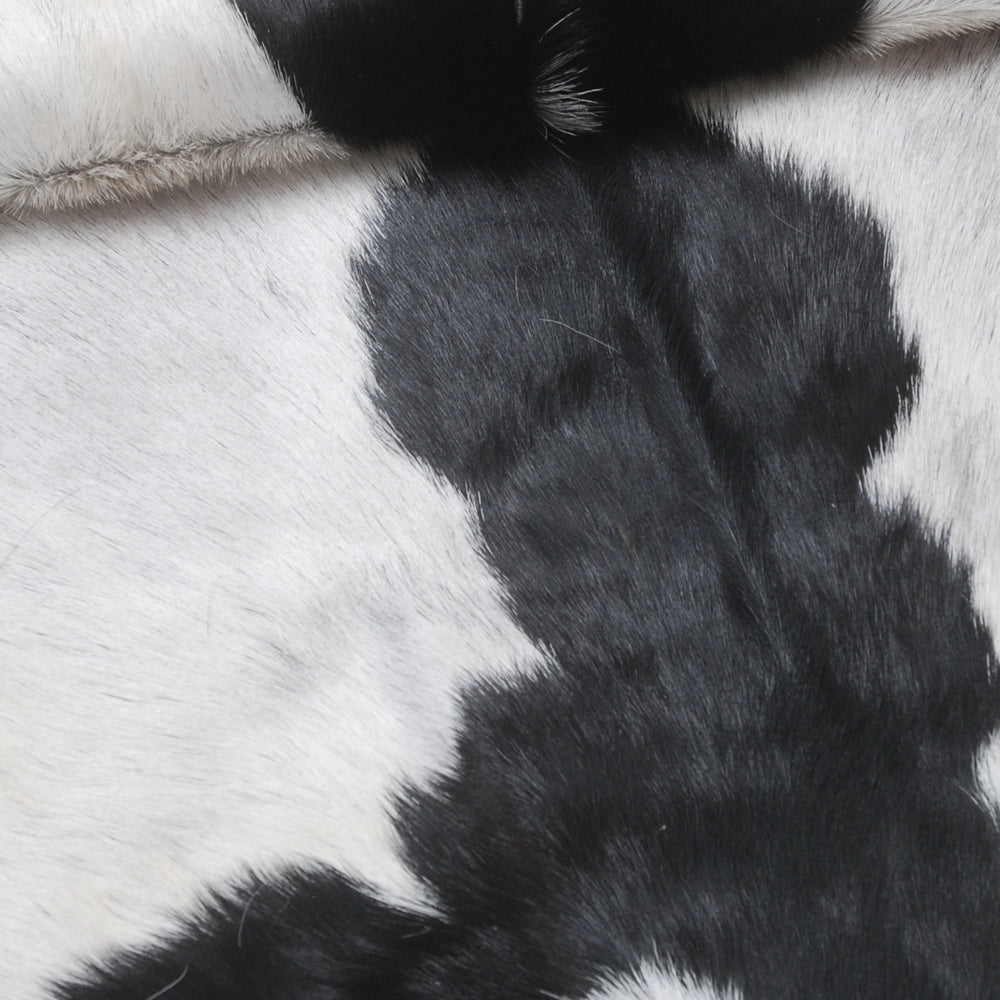Sophisticated Black & White Goat Skin Rug - Modern Decor Accent for Home - Natural, Soft, and Unique Animal Skin Throw Rug - Celestial Leather Limited
