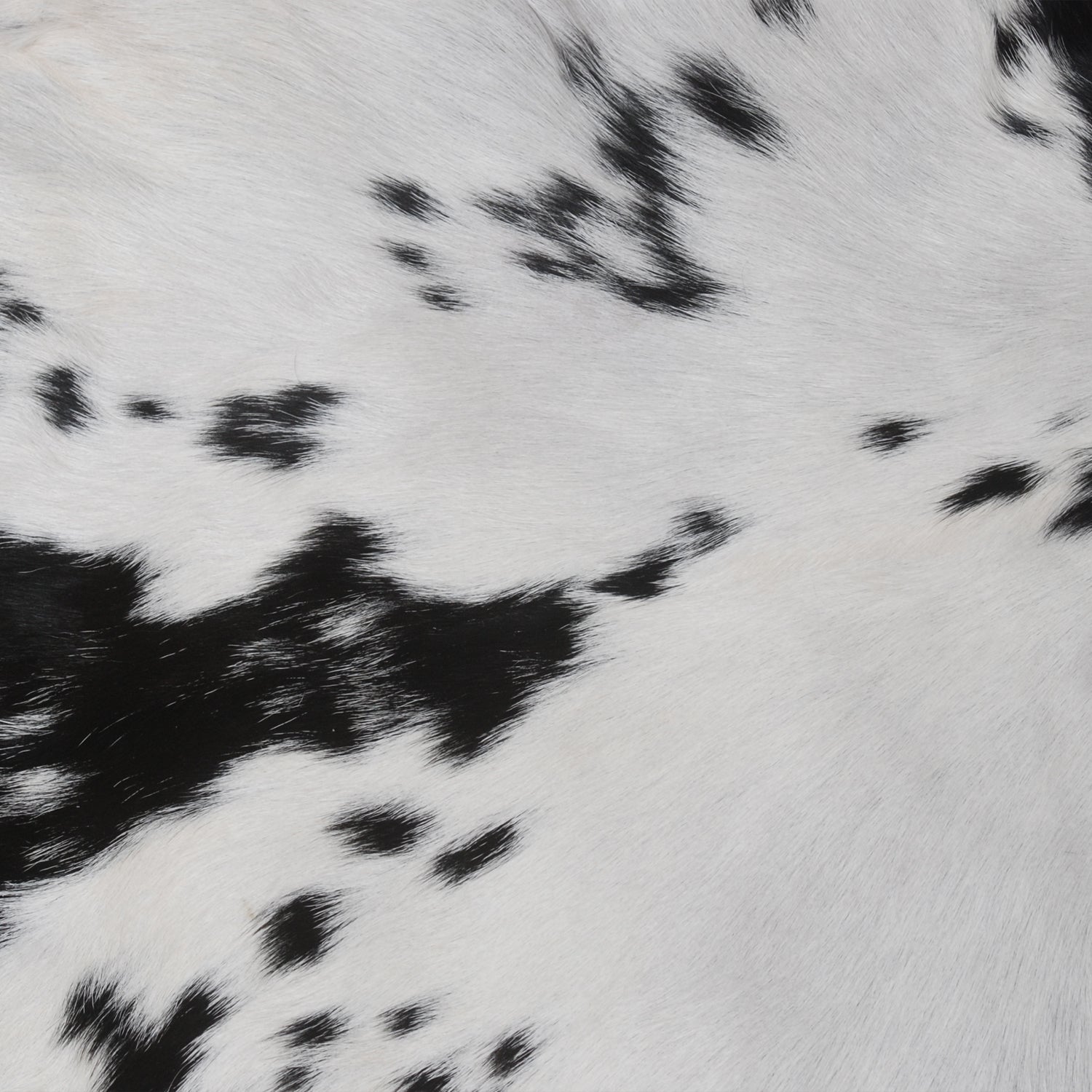 Stylish Black and White Goat Hide Rug - Unique Natural Pattern for Modern Homes