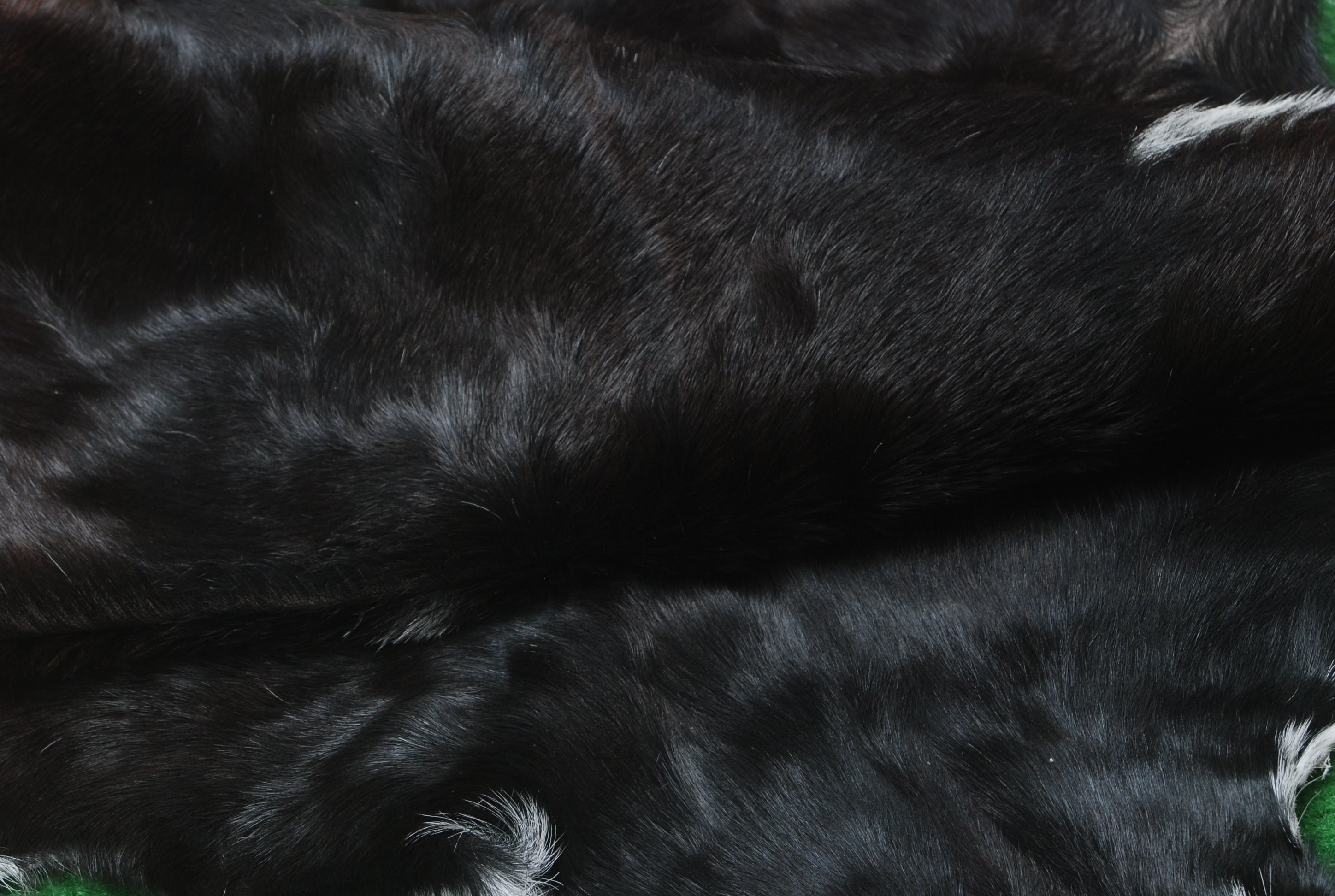 Elegant Black and White Goat Hide Rug - Perfect Accent for Any Room