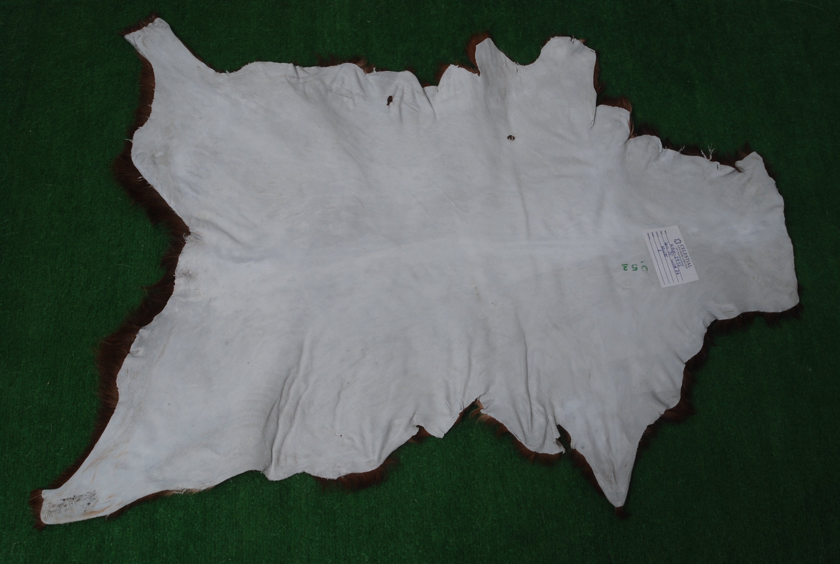 Natural Tri-Color Goat Hide Rug - Luxurious Accent for Rustic and Modern Spaces