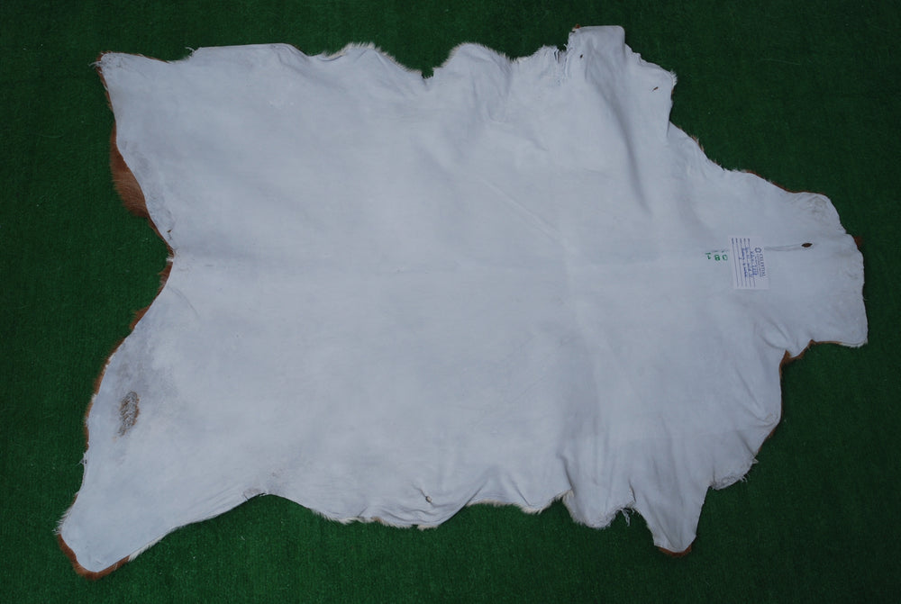 Luxurious Brown & White Premium Goatskin Rug | Handcrafted Hair-On Rug for Timeless Elegance - Sophistication in Any Room - Celestial Leather Limited